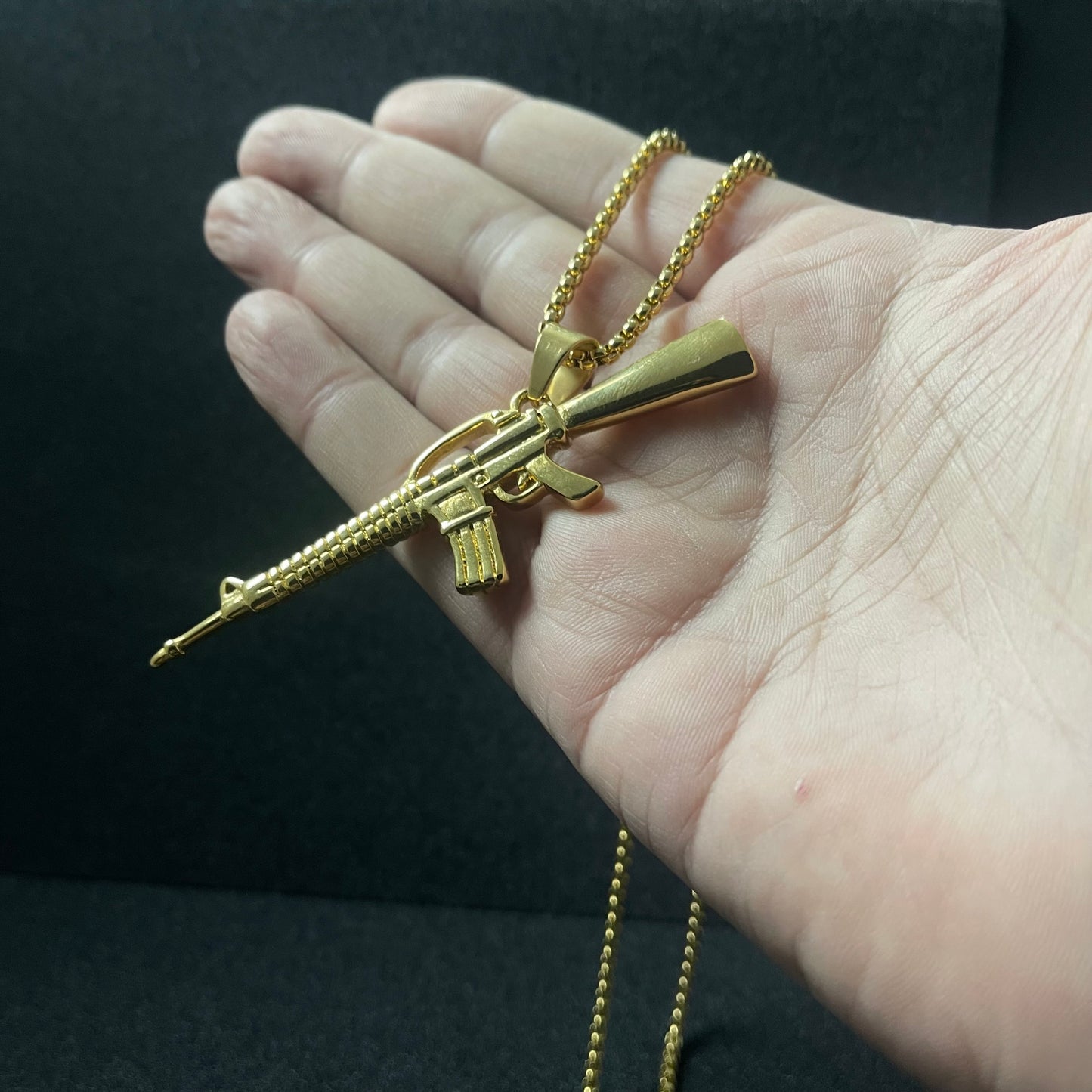 golden pistol rifle m16 pendant necklace for men online in pakistan