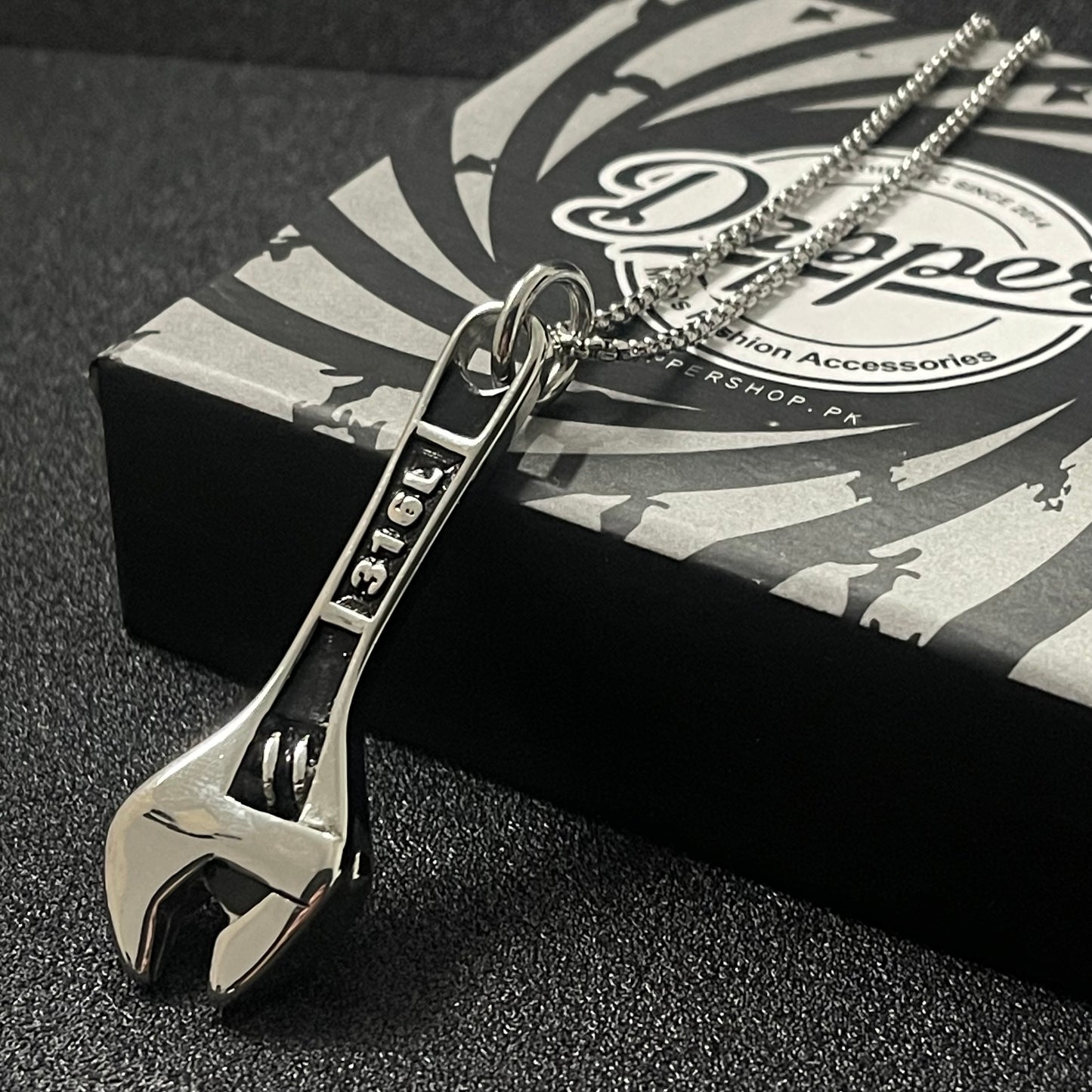 stainless steel golden wrench pendant necklace for men in pakistan