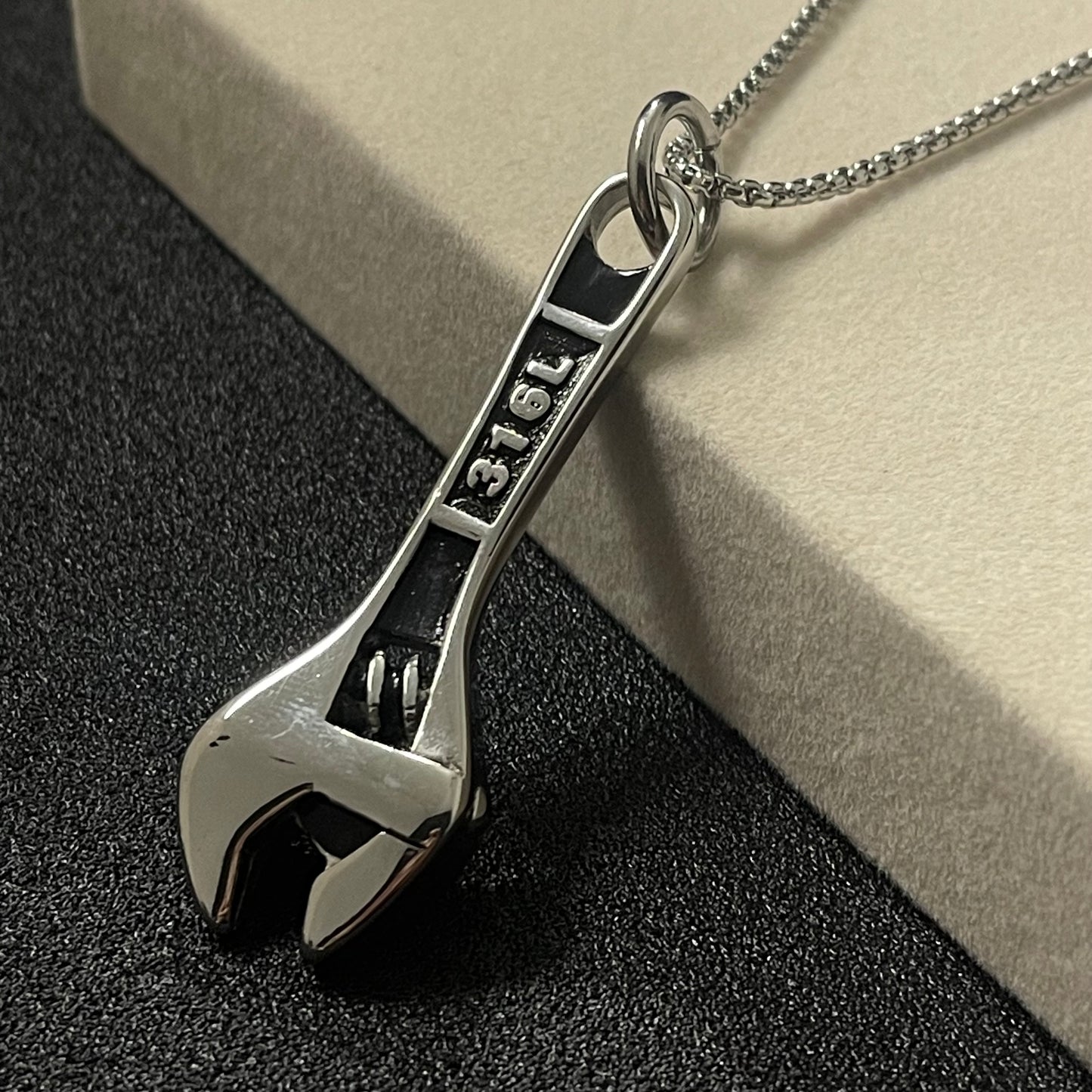 stainless steel golden wrench pendant necklace for men in pakistan