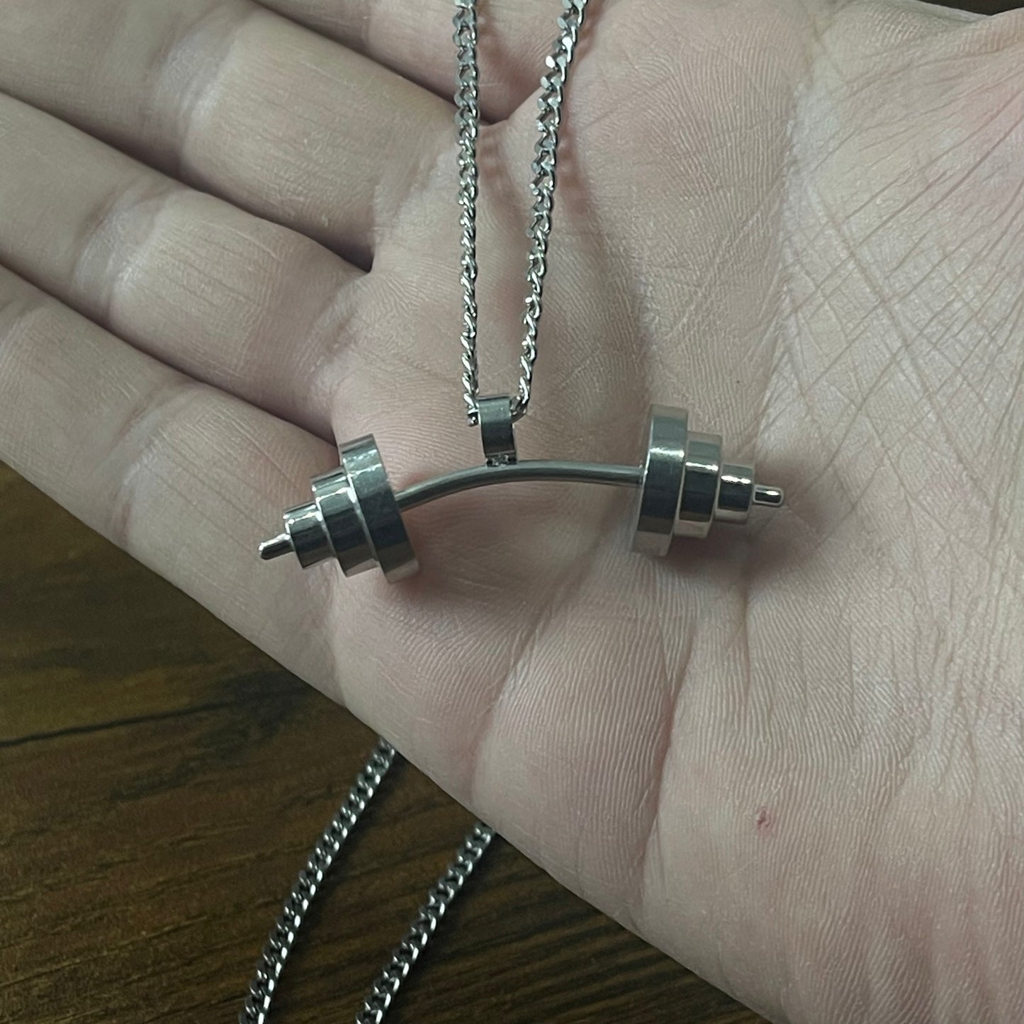 stainless steel silver fitness dumbbell pendant necklace for men online in pakistan