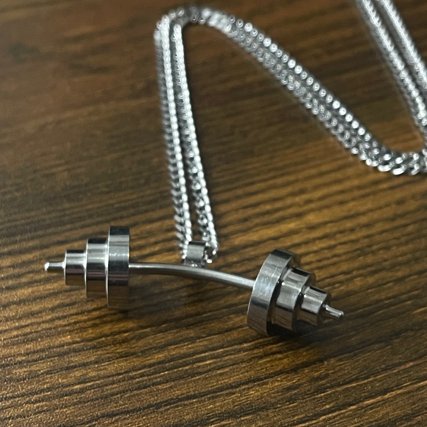 stainless steel silver fitness dumbbell pendant necklace for men online in pakistan
