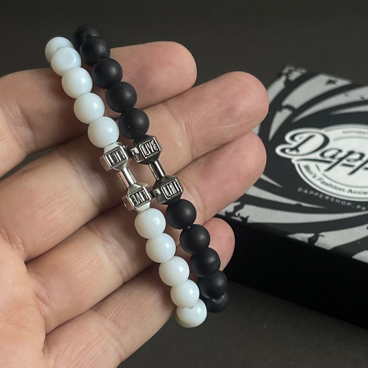 white and black dumbbell beads bracelet in Pakistan