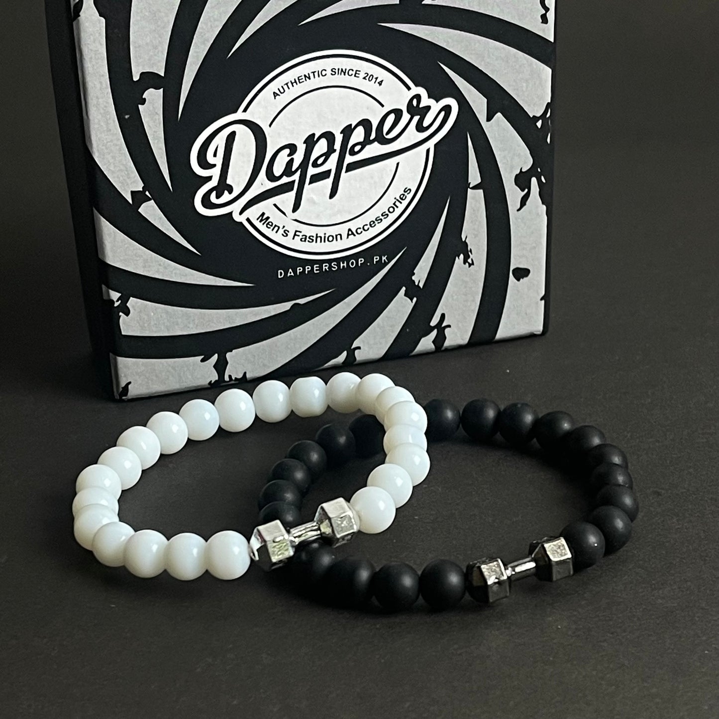 white and black dumbbell beads bracelet in Pakistan