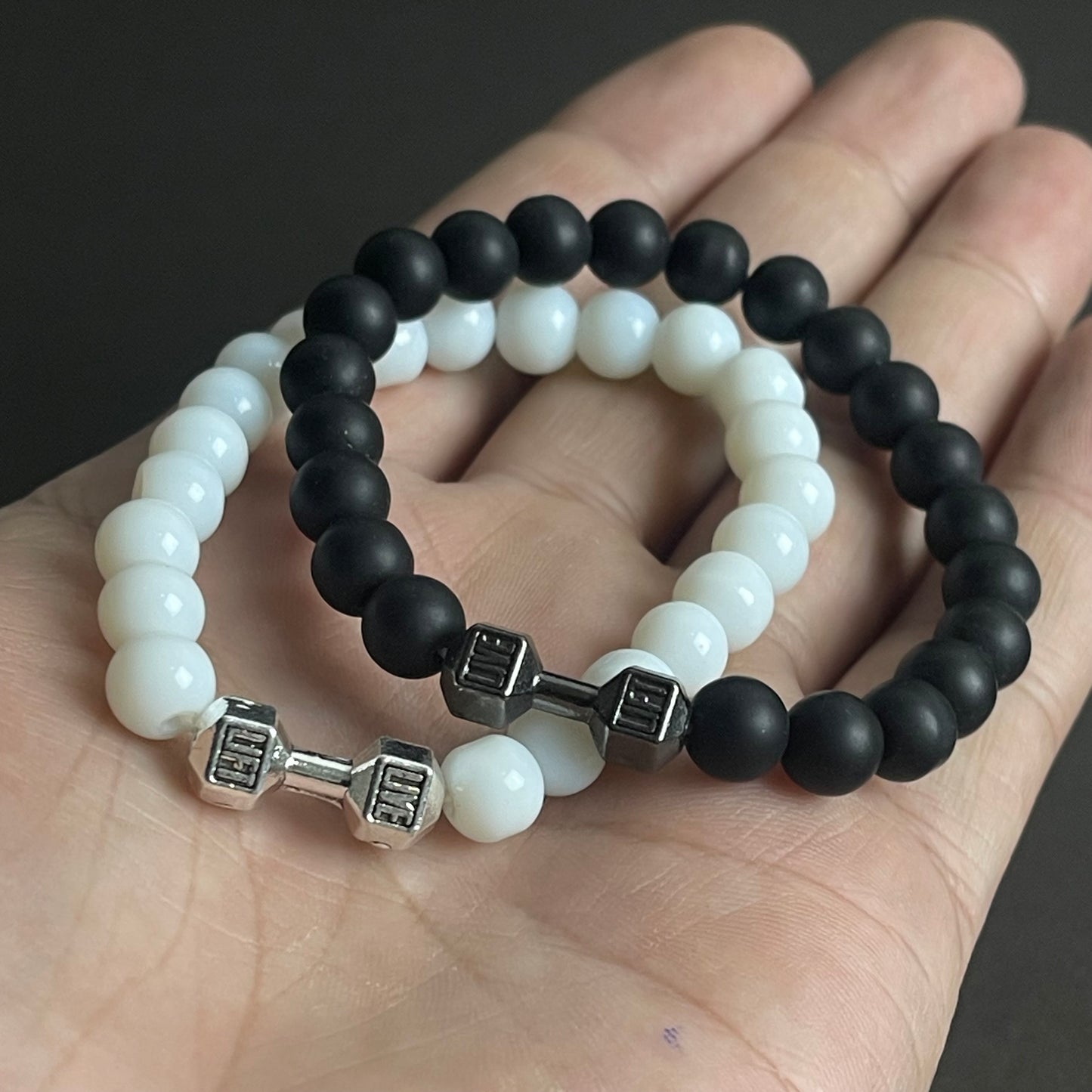 white and black dumbbell beads bracelet in Pakistan