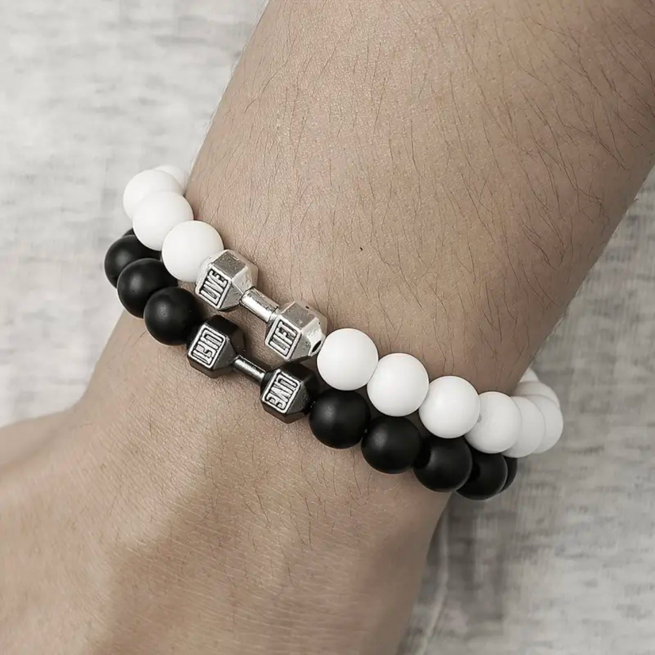 white and black dumbbell beads bracelet in Pakistan