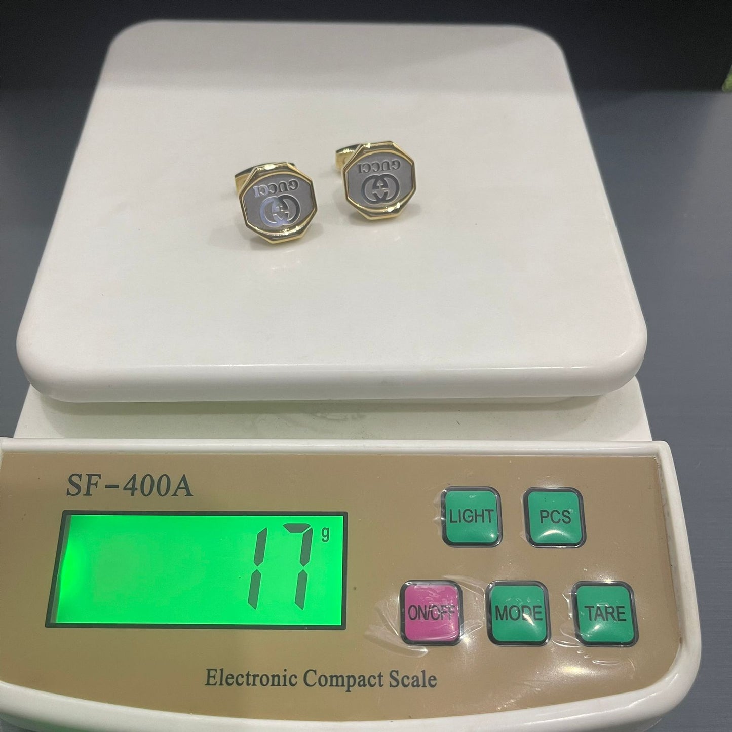 Gucci Silver Golden branded cufflinks for men online in Pakistan