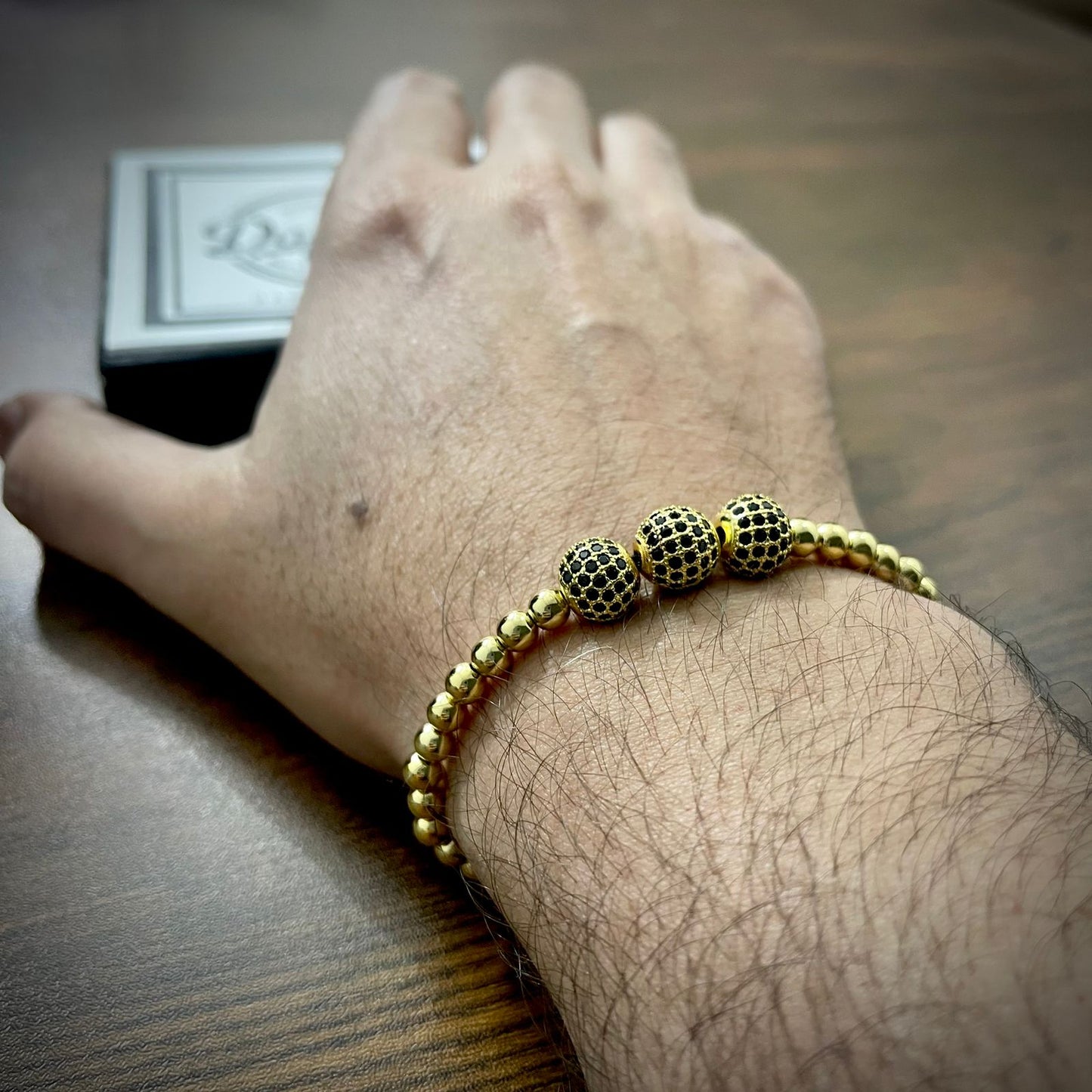 Golden Cubical Zircon Paved Triple Beads Bracelet