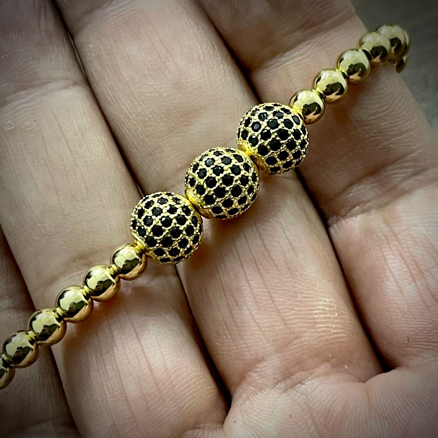 Golden Cubical Zircon Paved Triple Beads Bracelet