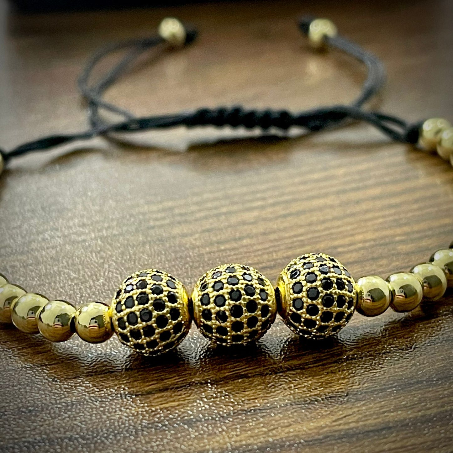 Golden Cubical Zircon Paved Triple Beads Bracelet