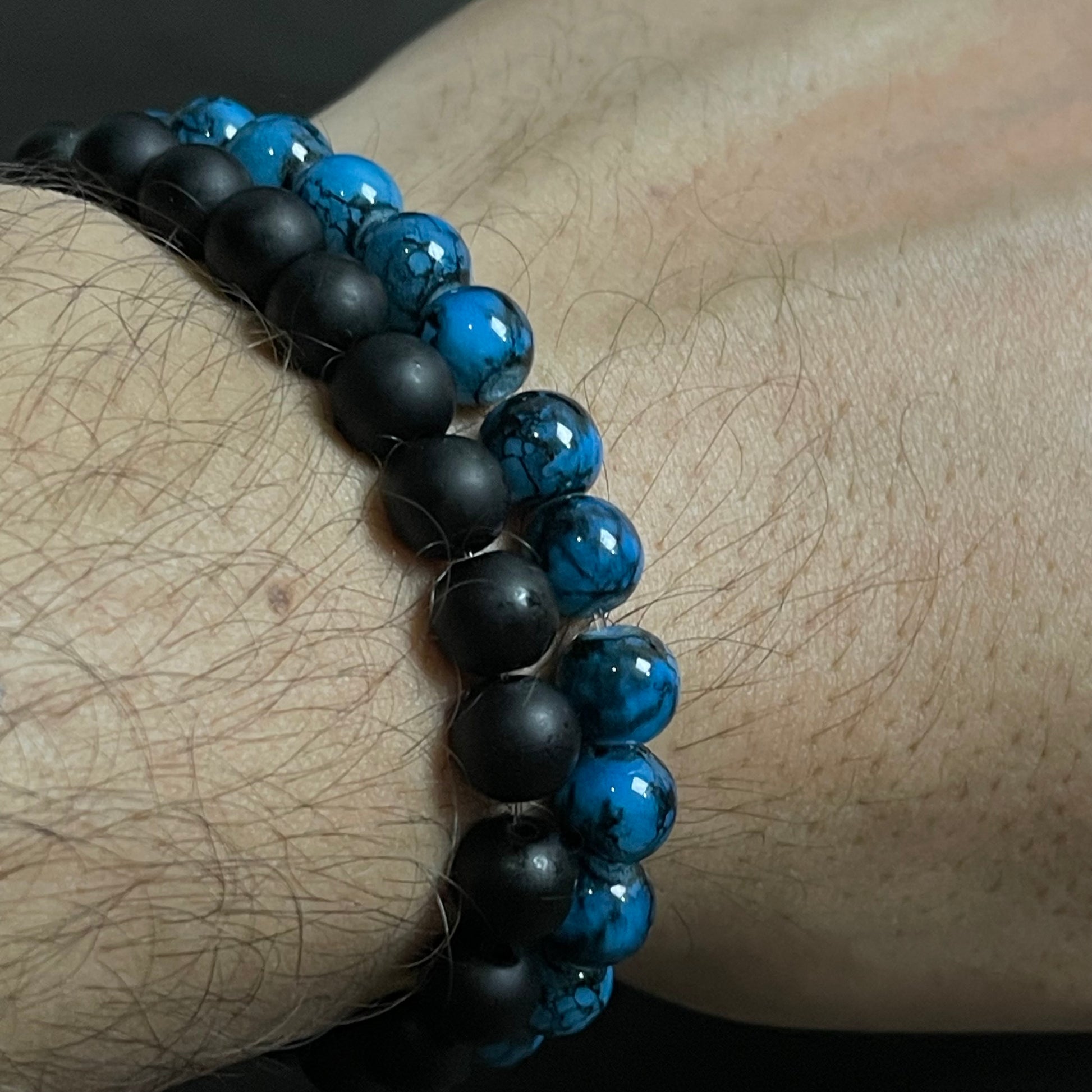 blue and black stone beads distance bracelet online in pakistan