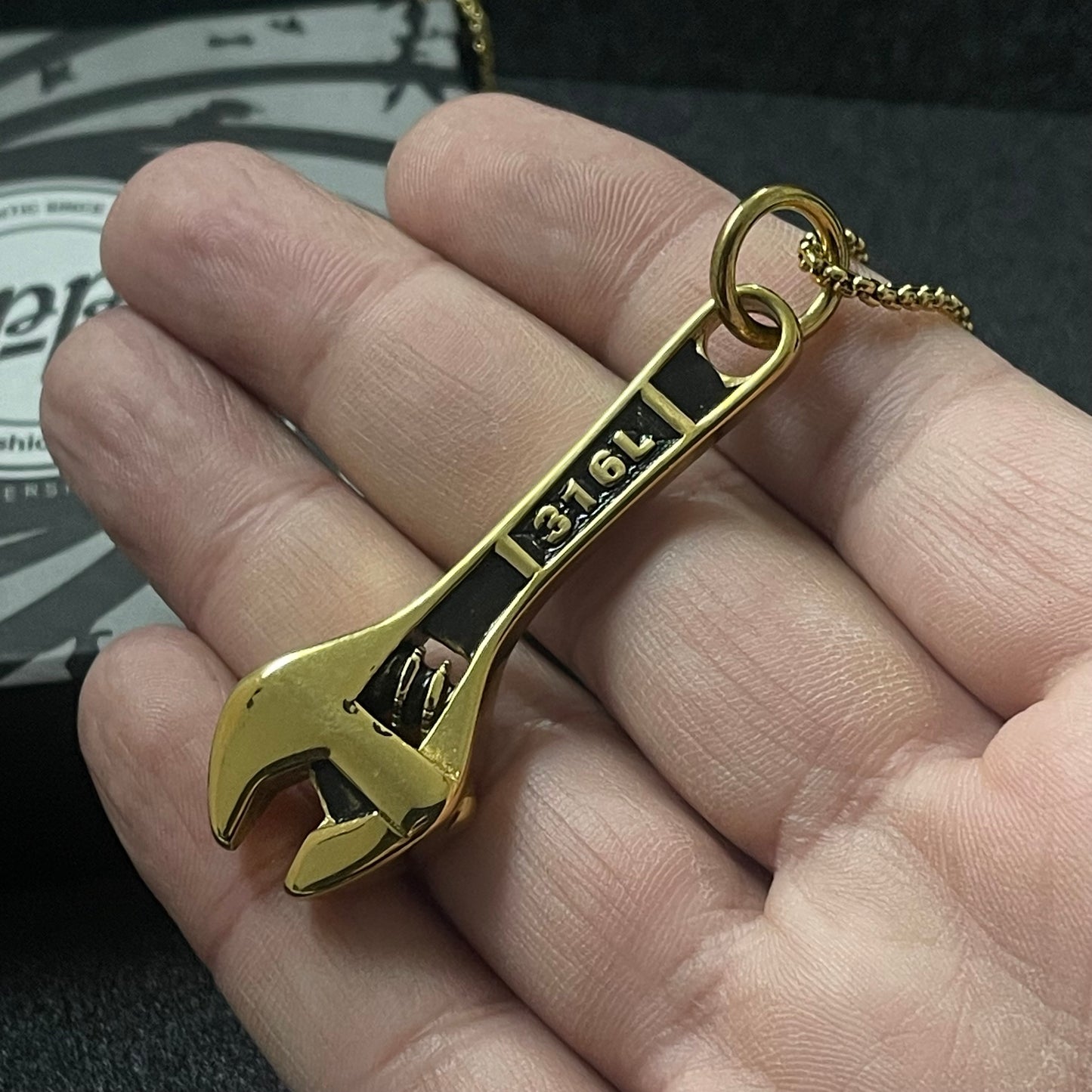stainless steel golden wrench pendant necklace for men in pakistan