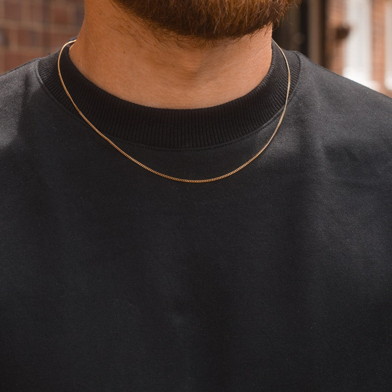 1.5mm thin golden curb link neck chain for men online in Pakistan