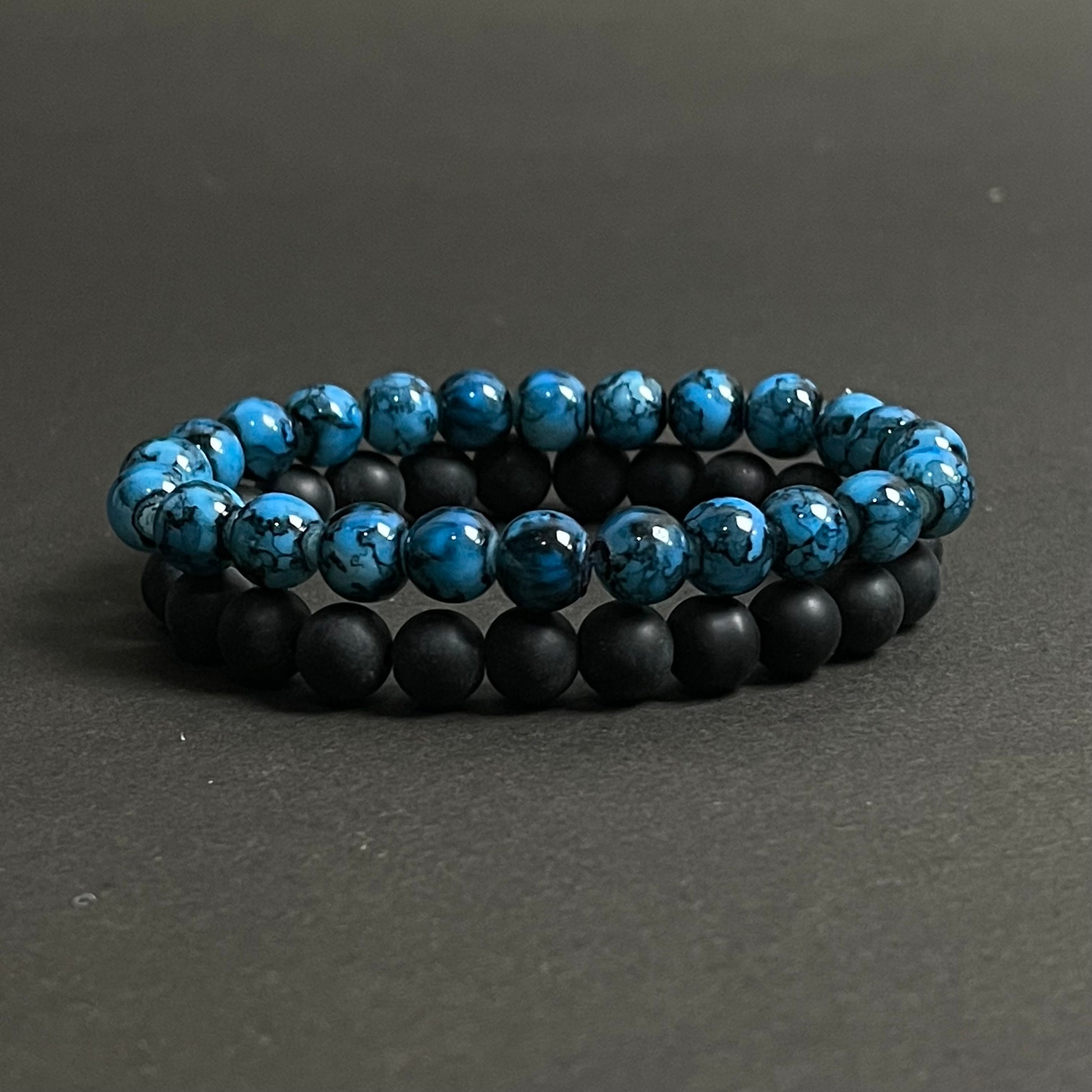 blue and black stone beads distance bracelet online in pakistan