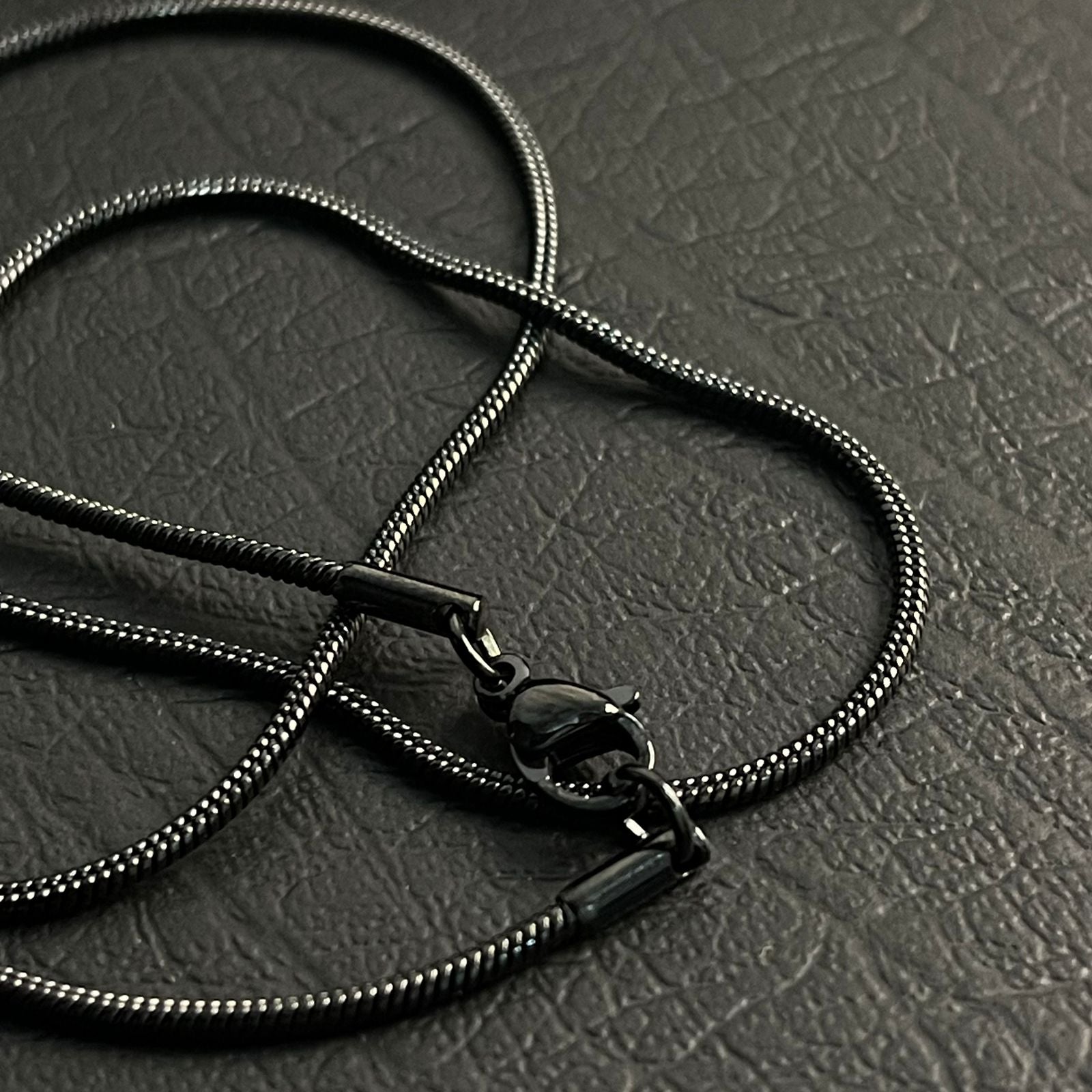 1mm sleek black round snake herringbone neck chain for men in Pakistan