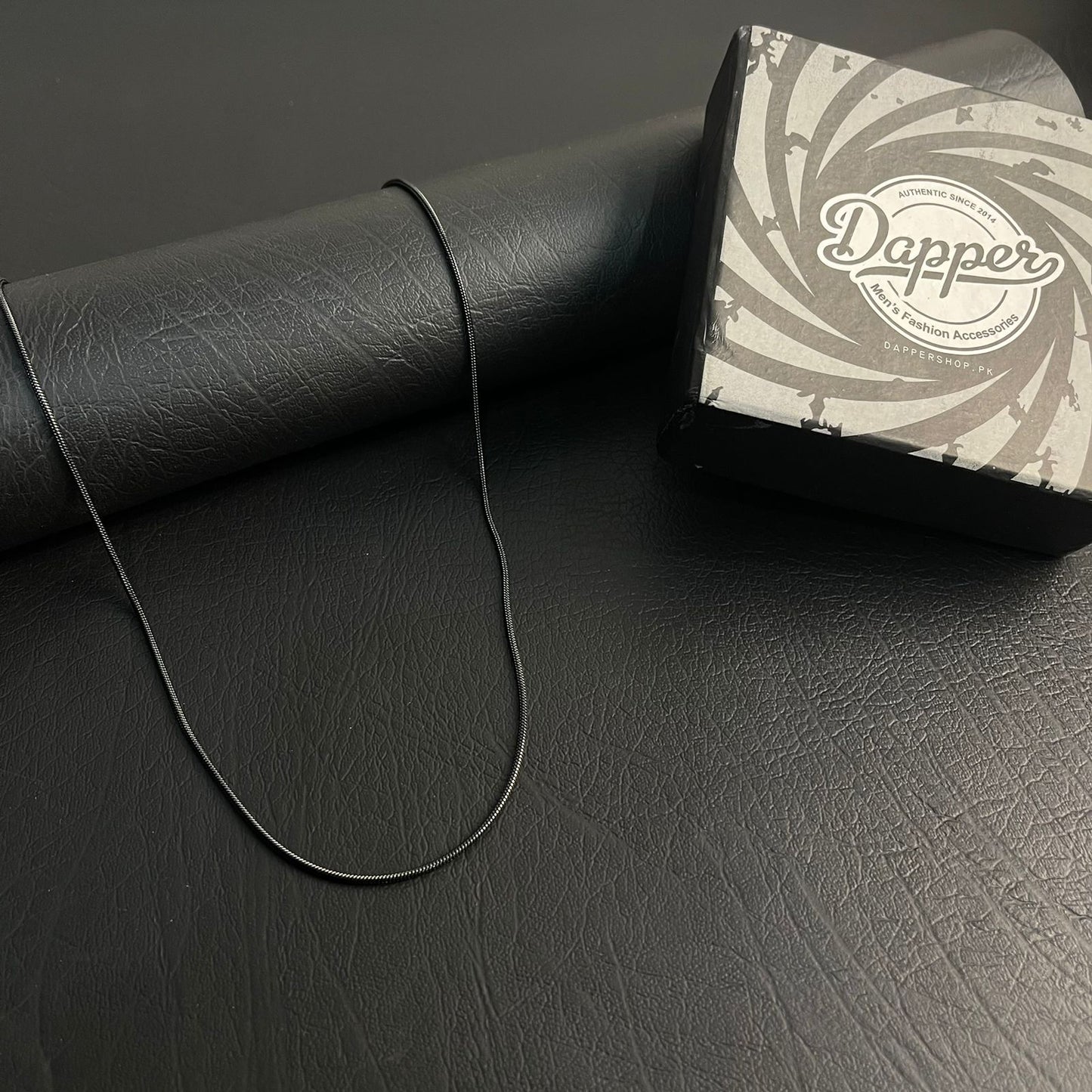 1mm sleek black round snake herringbone neck chain for men in Pakistan