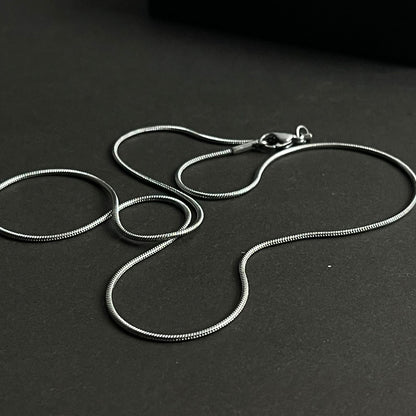 1mm sleek silver round snake herringbone neck chain for men in Pakistan