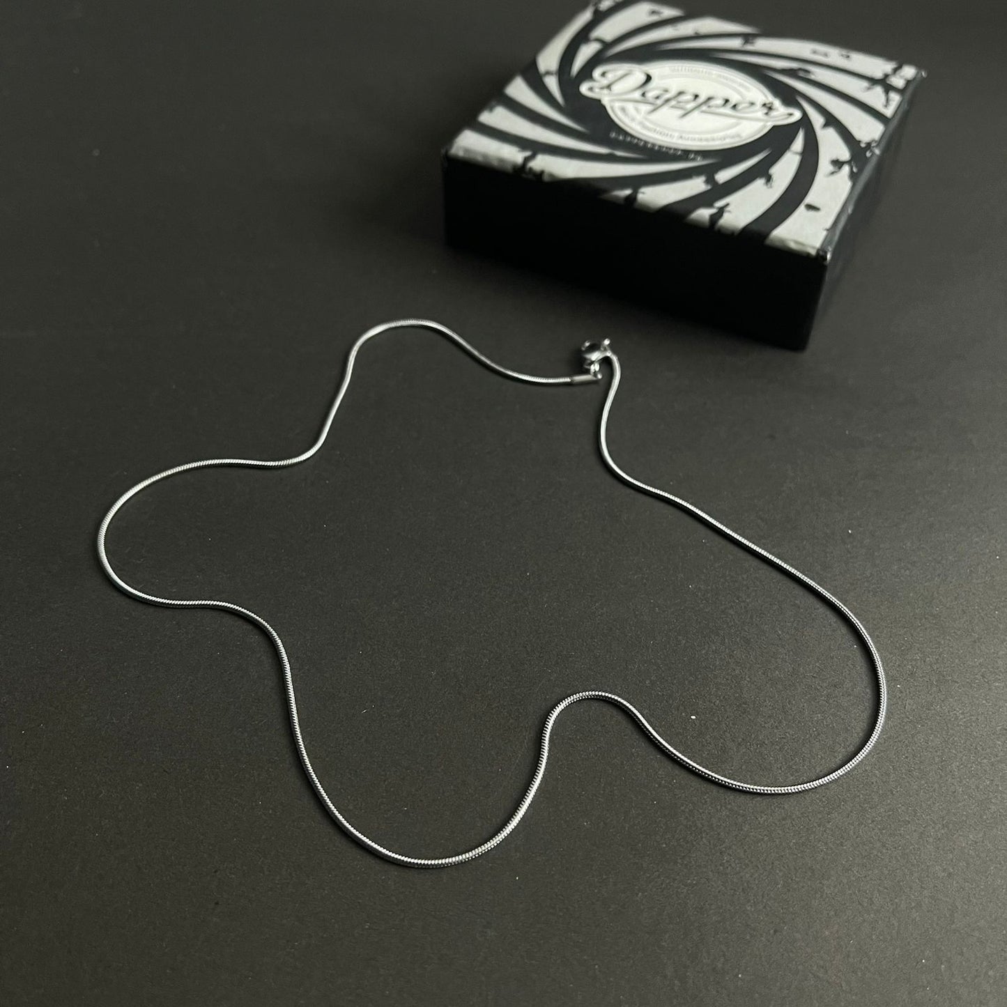 1mm sleek silver round snake herringbone neck chain for men in Pakistan
