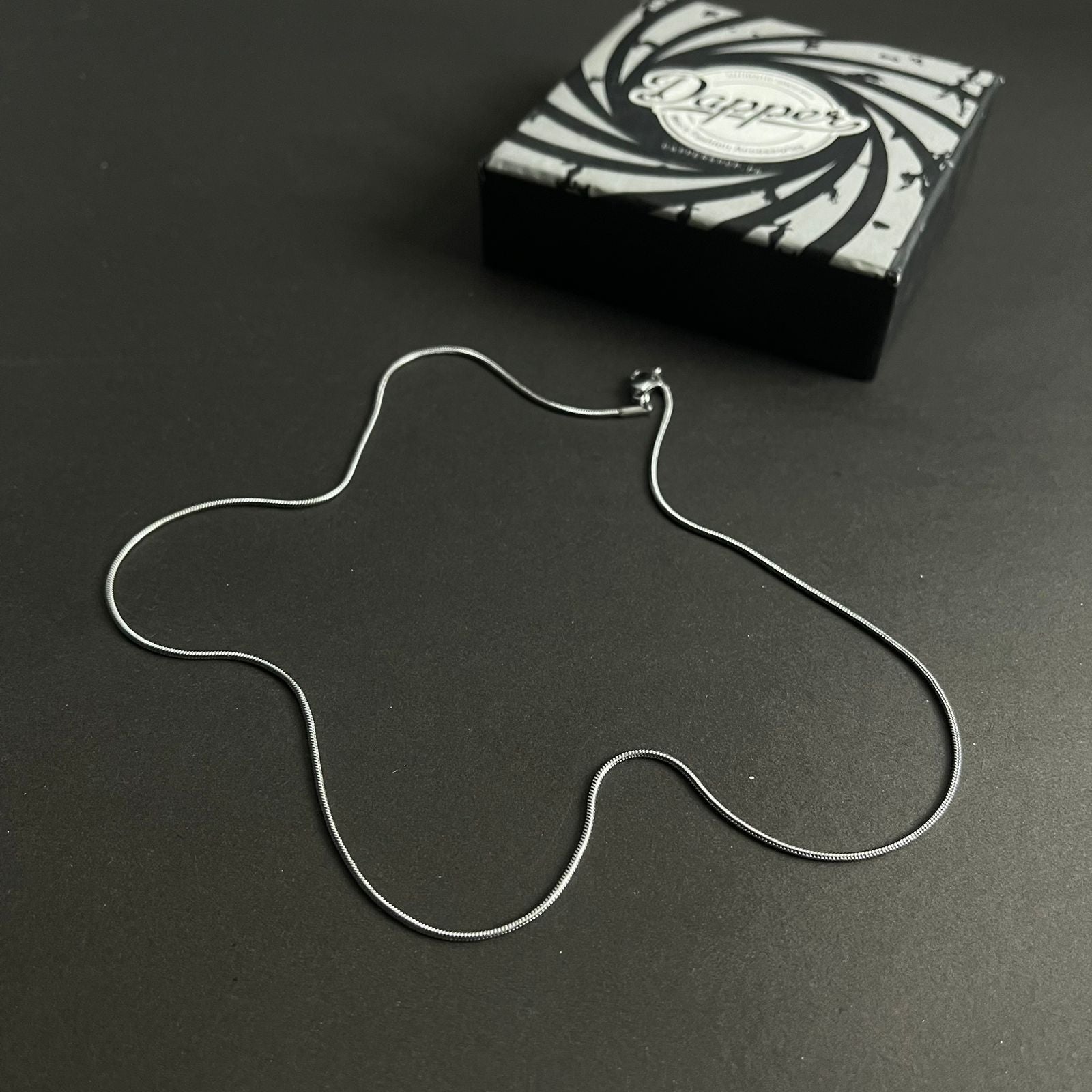 1mm sleek silver round snake herringbone neck chain for men in Pakistan