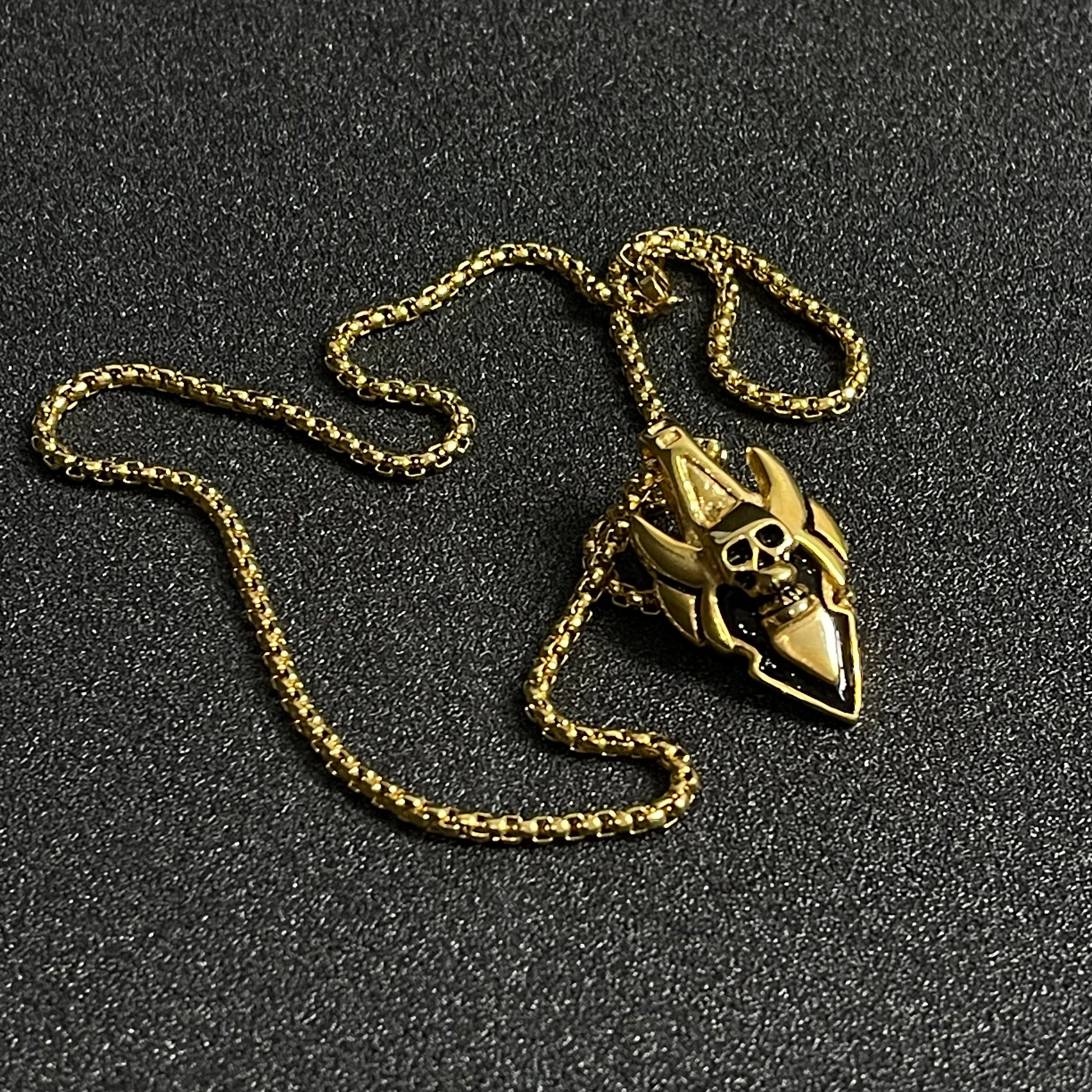 golden skull pendant in pakistan