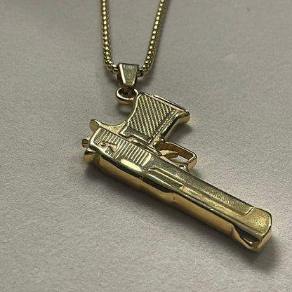 golden pistol rifle pendant necklace for men online in pakistan