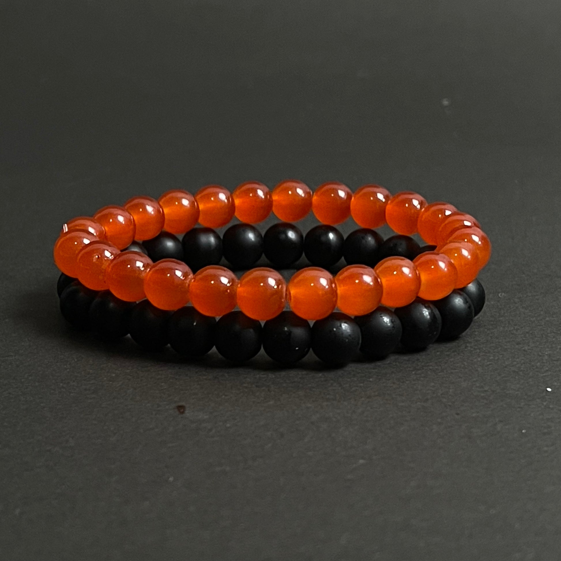 Red and black stone beads distance bracelet online in pakistan