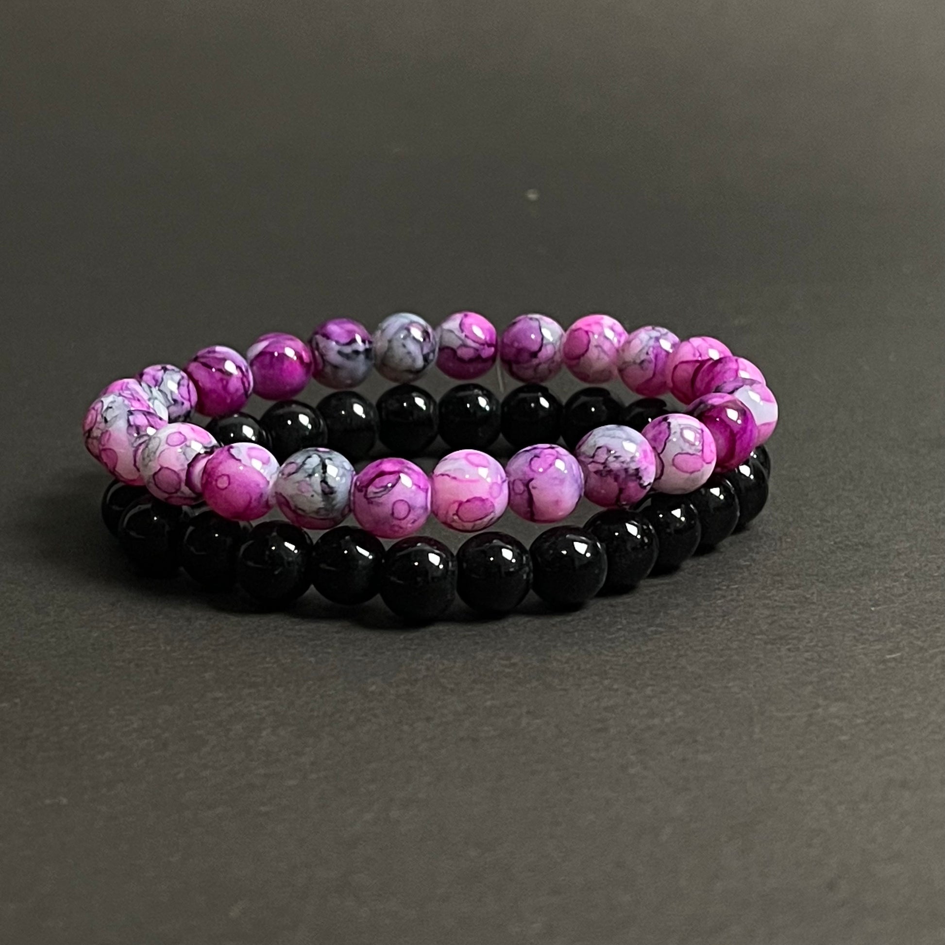 Purple and black stone beads distance bracelet online in pakistan