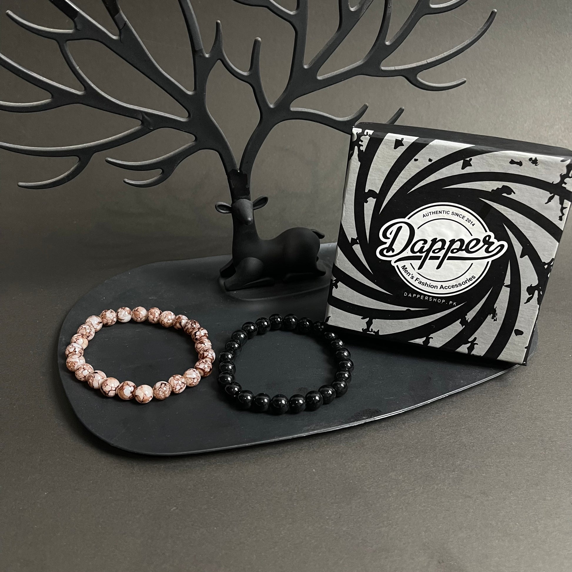 Brown and black stone beads distance bracelet online in pakistan