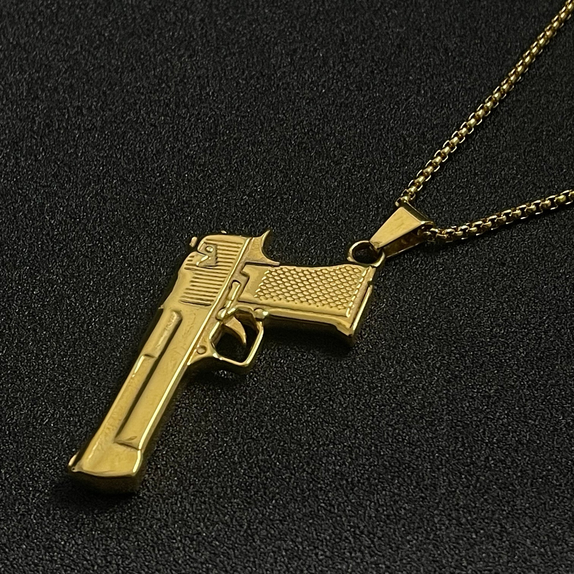 golden pistol rifle pendant necklace for men online in pakistan