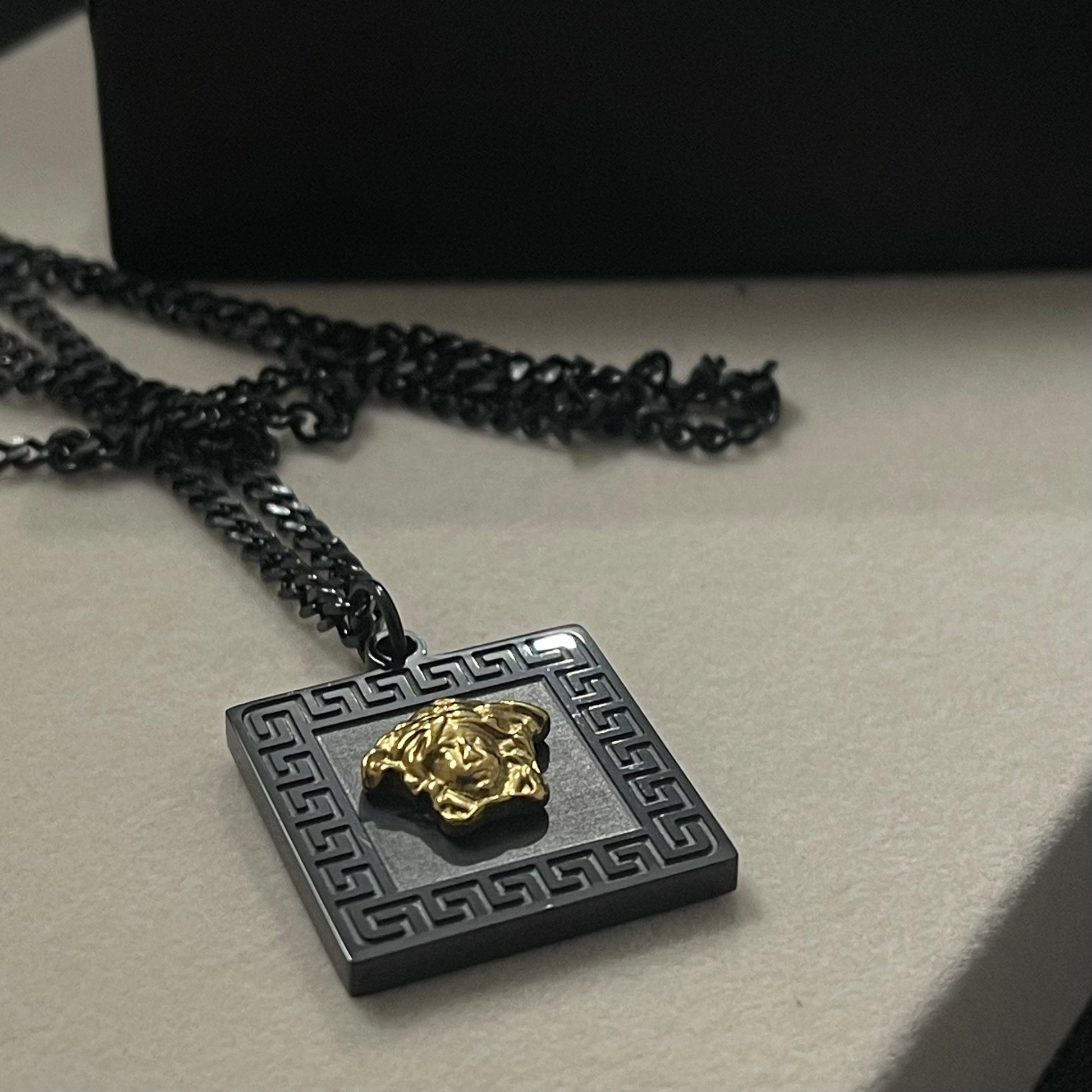 black golden versace medusa pendant necklace for men women in pakistan