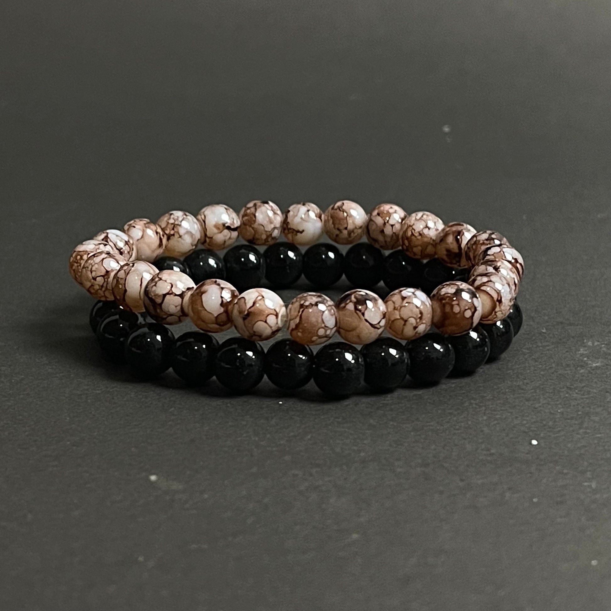 Brown and black stone beads distance bracelet online in pakistan