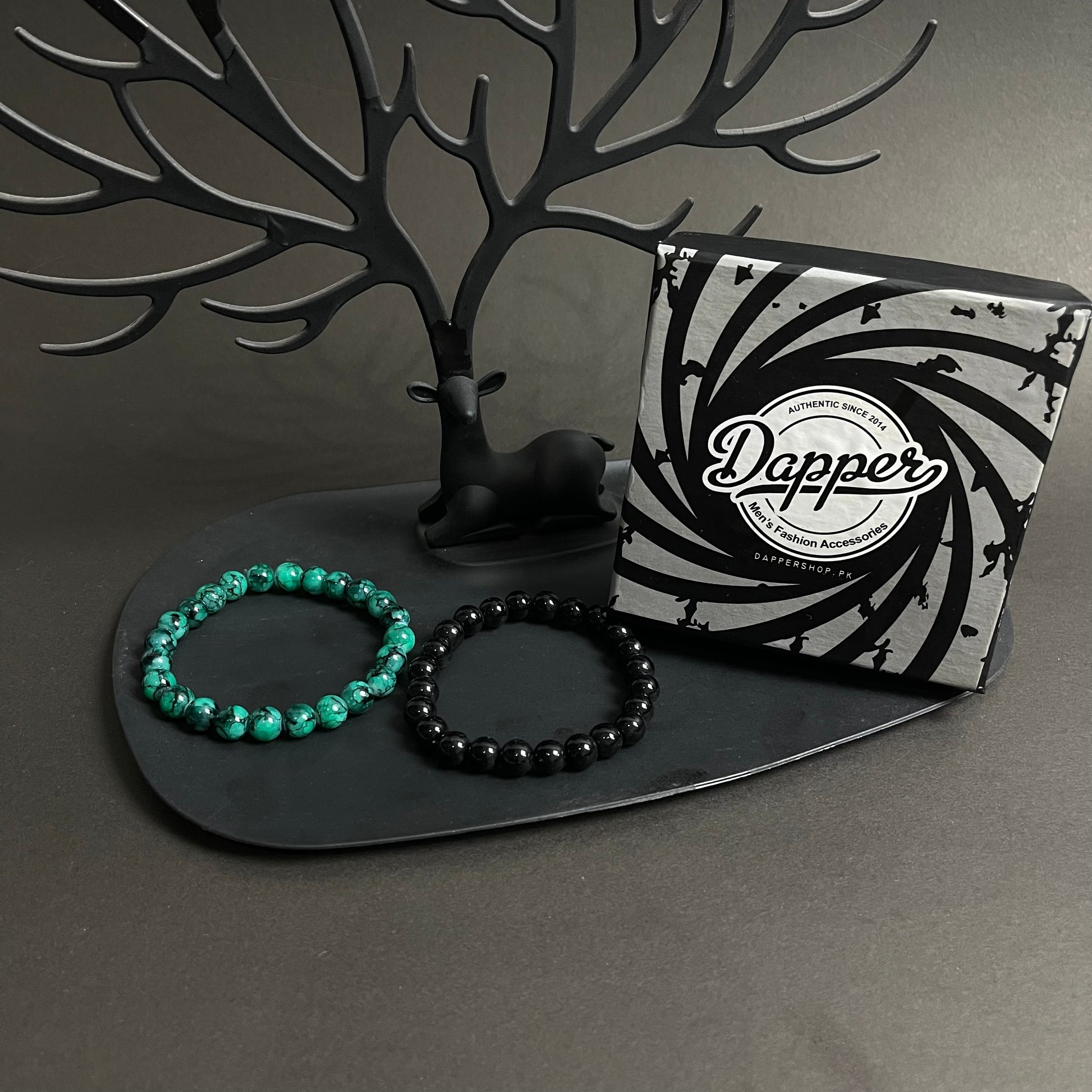 green and black stone beads distance bracelet online in pakistan