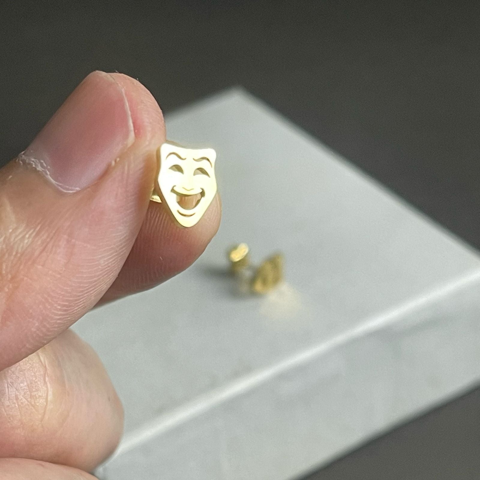 Golden mask earrings for men in Pakistan