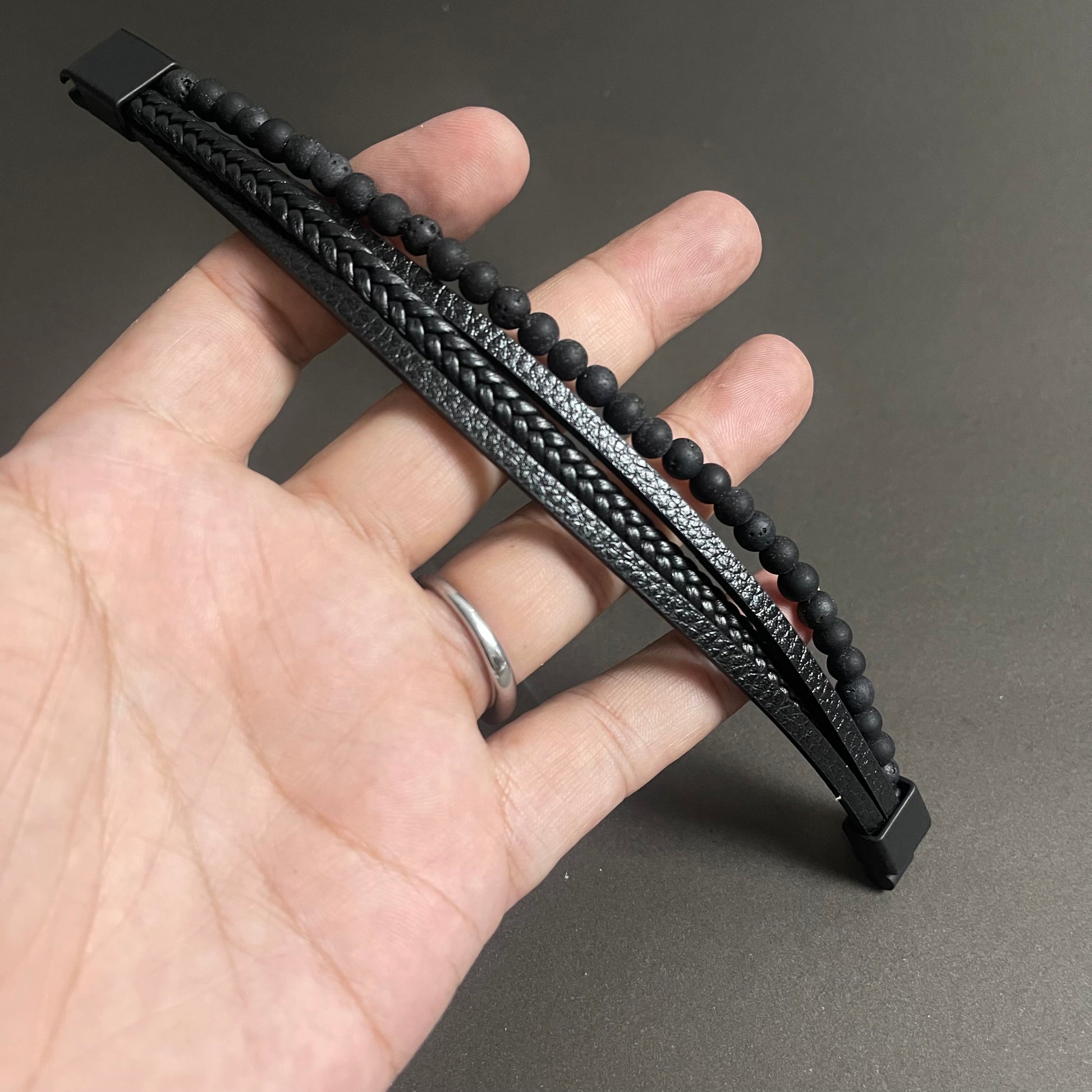 Magnetic clasp detail on leather bracelet