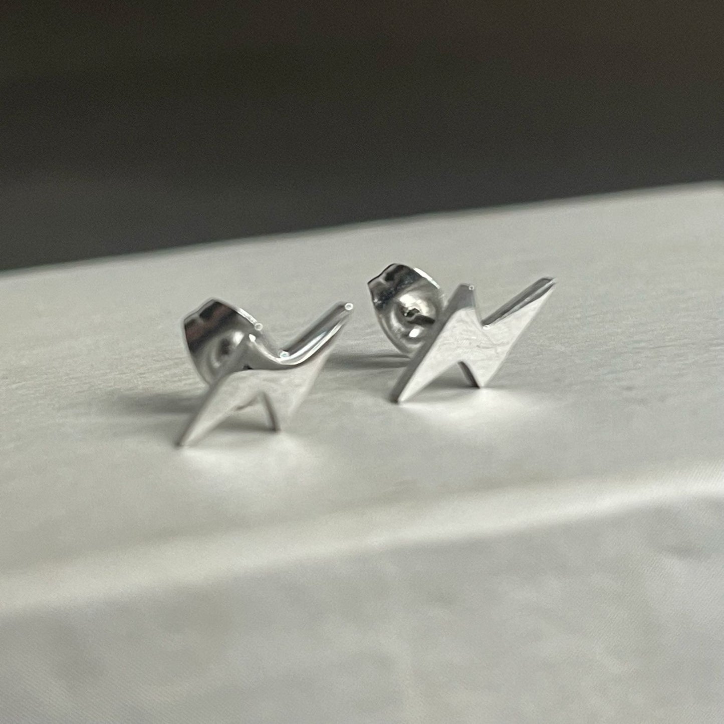 Silver light earrings for men online in Pakistan