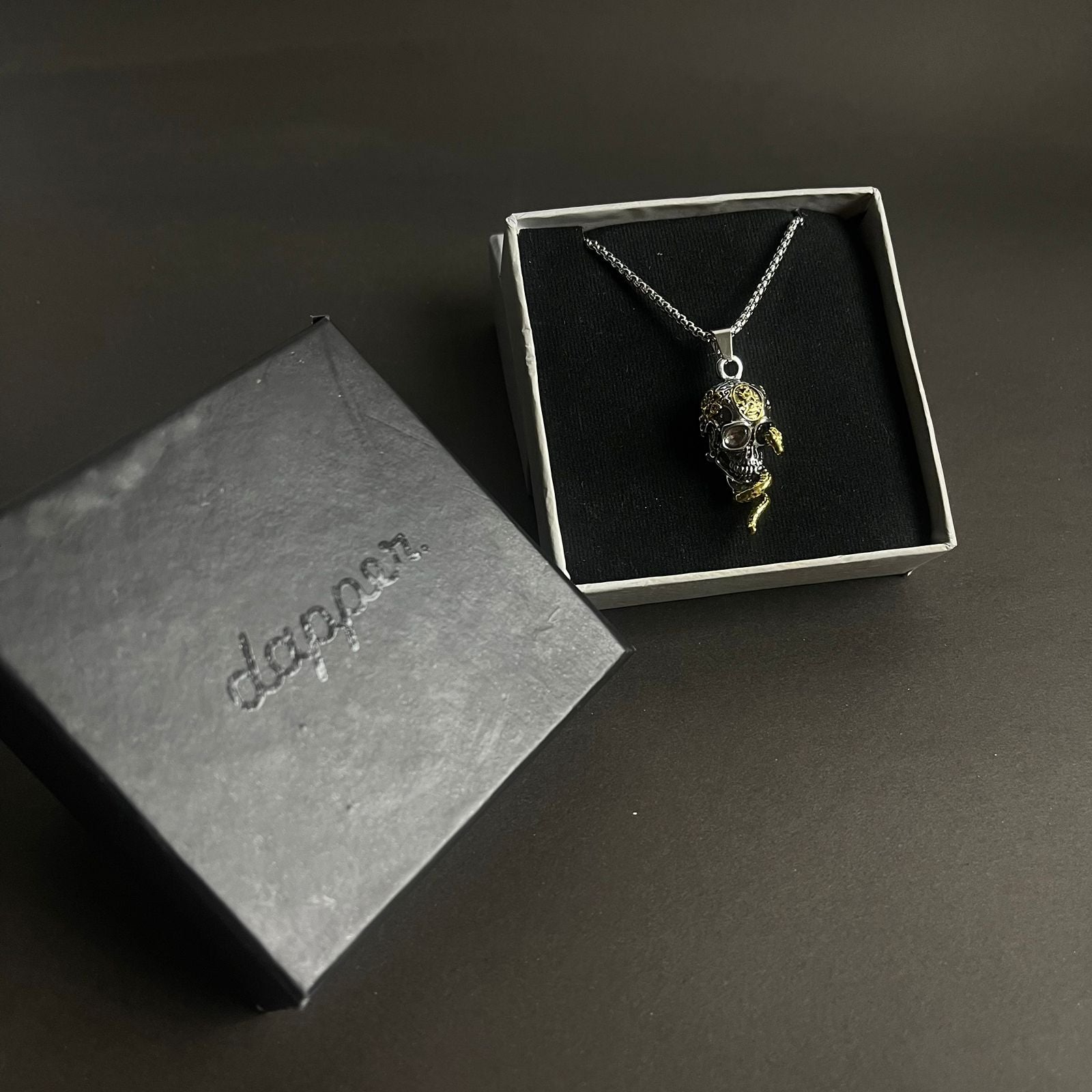 Skull and snake pendant necklace for men in Pakistan