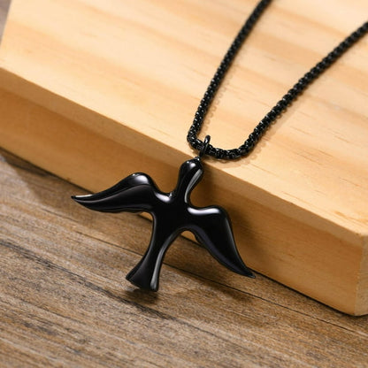 stainless steel black flying bird pendant necklace for men online in pakistan