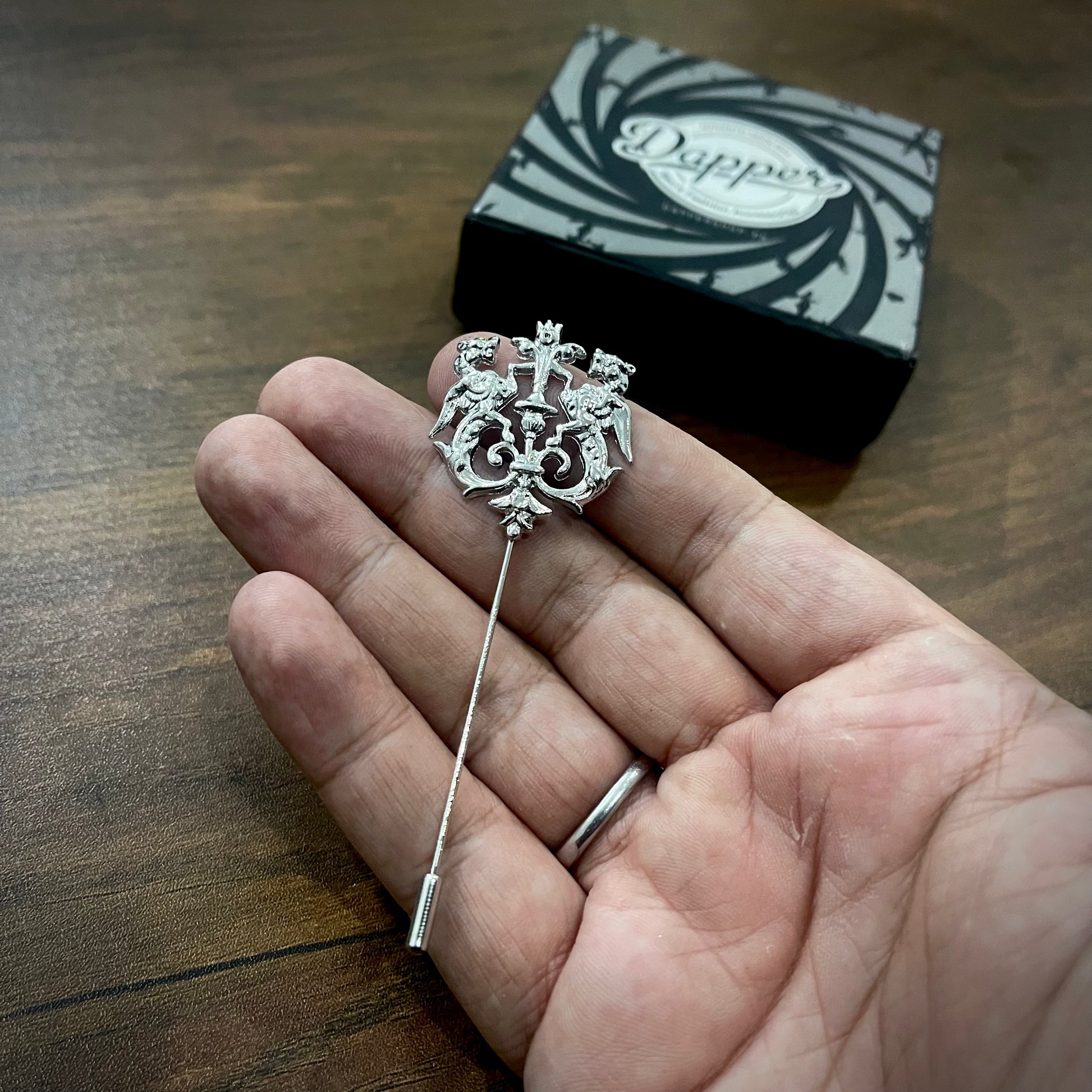 silver lion crown lapel pin in Pakistan