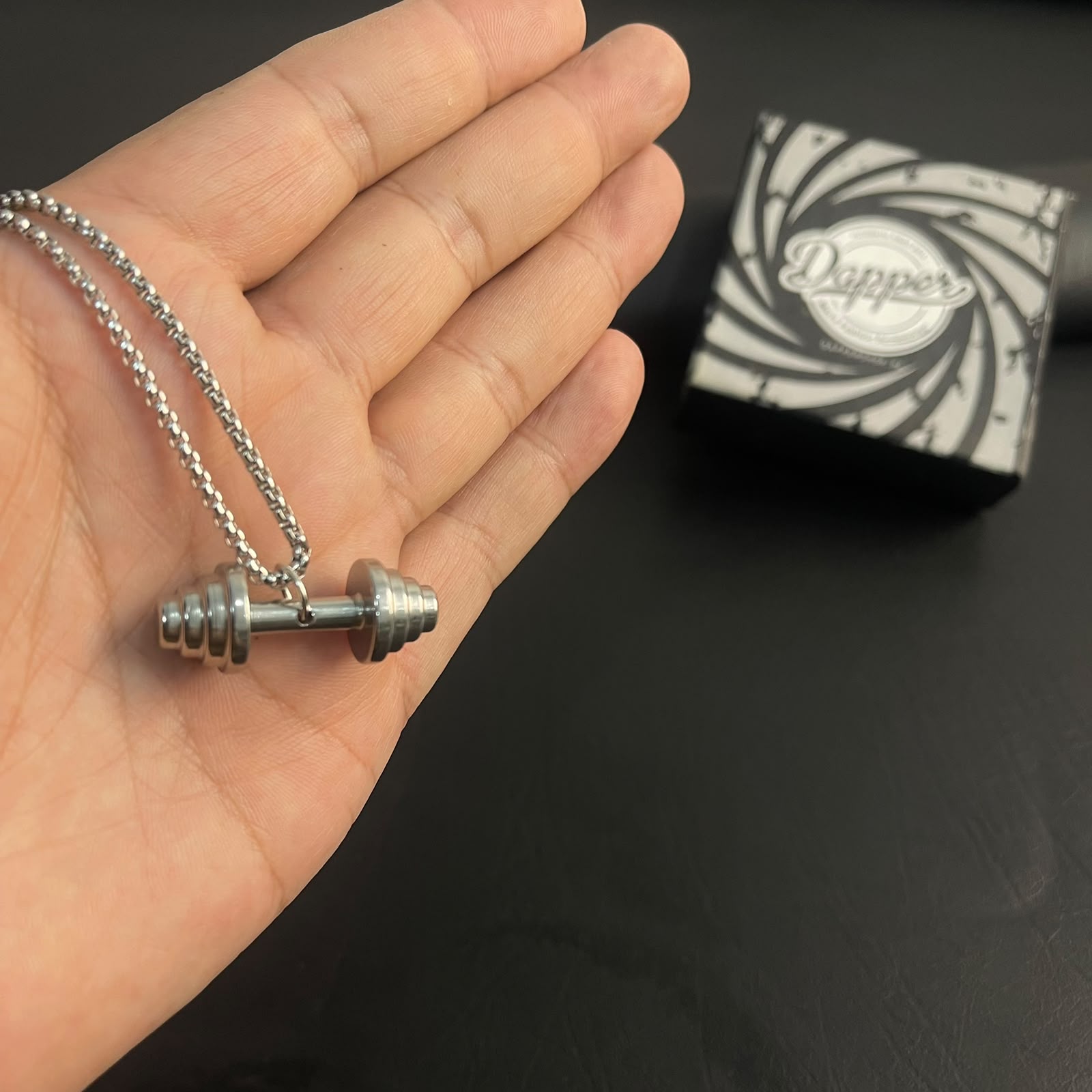 stainless steel dumbbell pendant for men in Pakistan