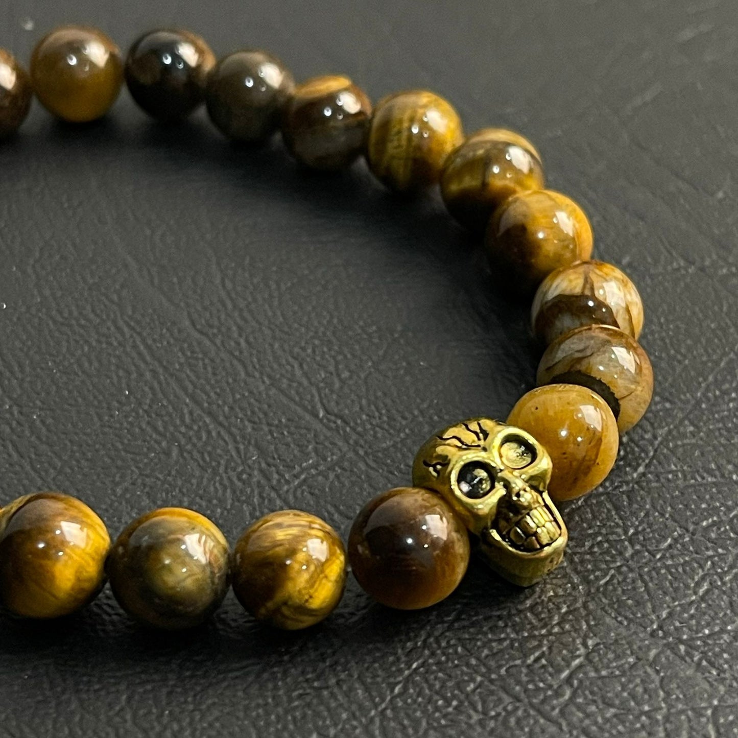tiger eye stone beads bracelet with golden skull online in Pakistan