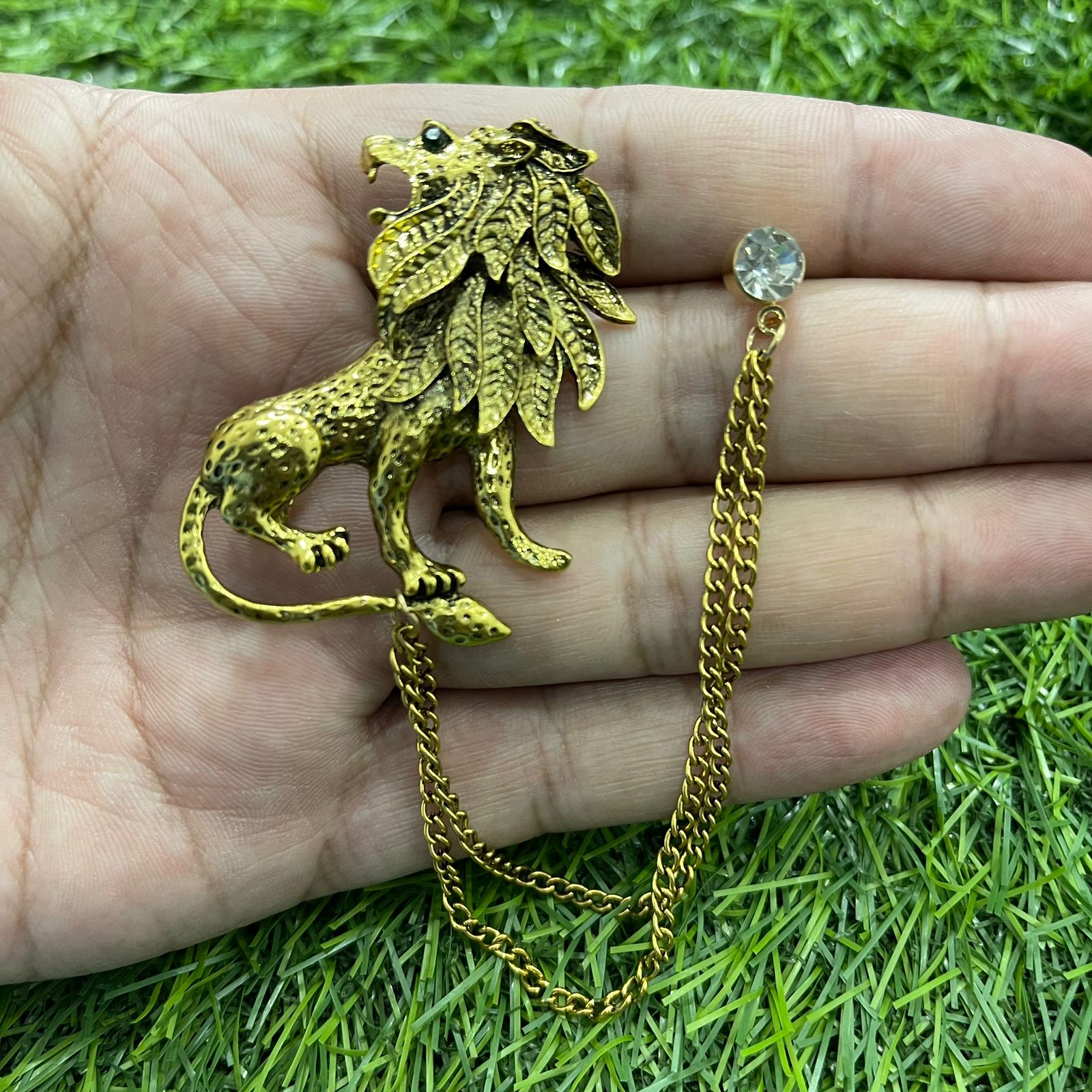 Lion brooch on sale