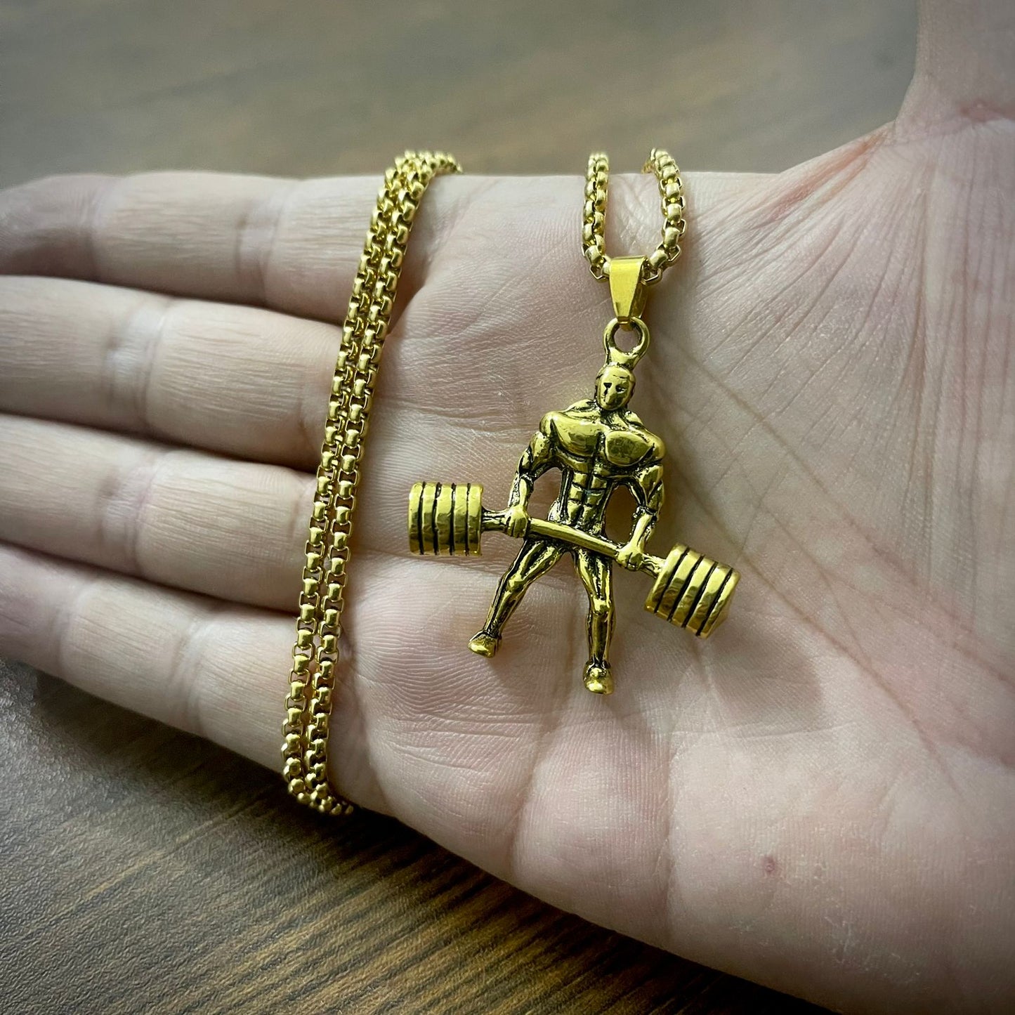 Body Builder With Barbell Pendant (Antique Gold)