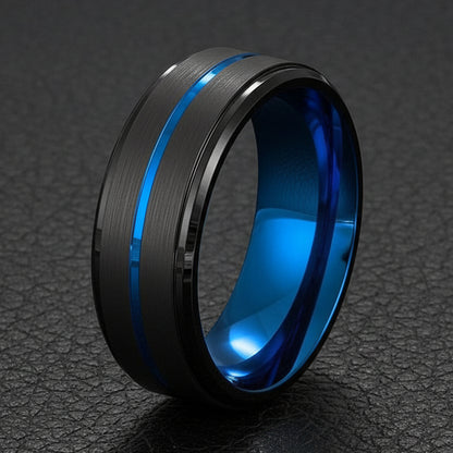 A black titanium ring with blue inlay, showing a polished exterior and a brushed texture finish, presented against a white background.