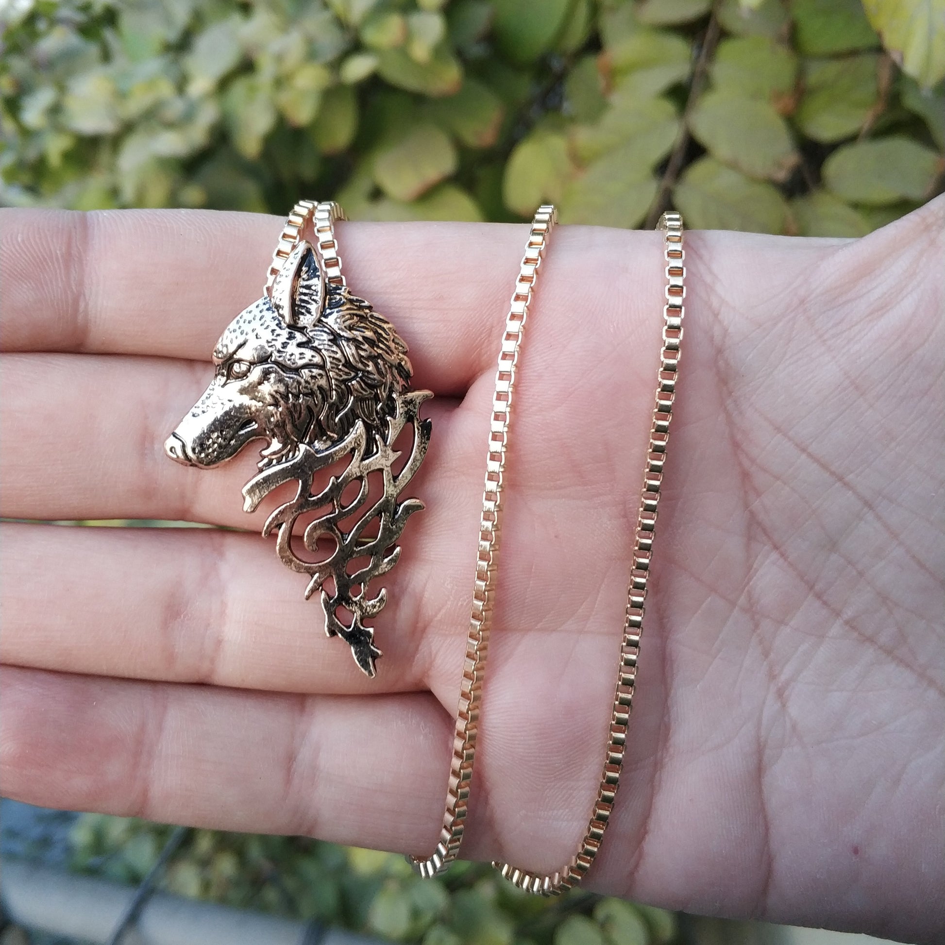 golden wolf head pendant necklace for men Pakistan